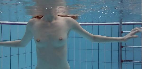 Anna Netrebko swims in pink lingerie in the pool